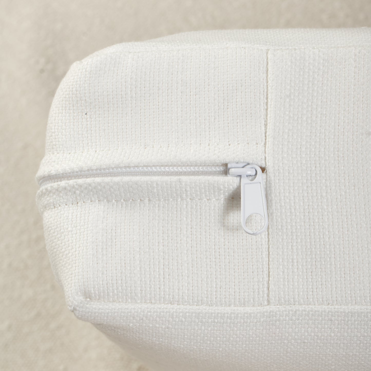 Close up of zipper detail on chair cushion